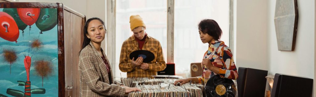 Three friends record shopping